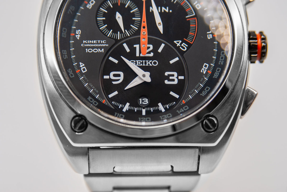 Seiko 7L22-0BB0 Kinetic Chronograph Limited Edition watch with raw steel case and black dial, numbered 1 of 200 — Bezel & Hide