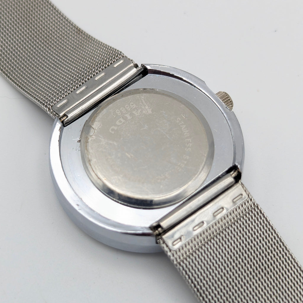 Raidu Spinning Disc Novelty Watch — Quartz, Mesh Strap, Sold Naked - Bezel & Hide