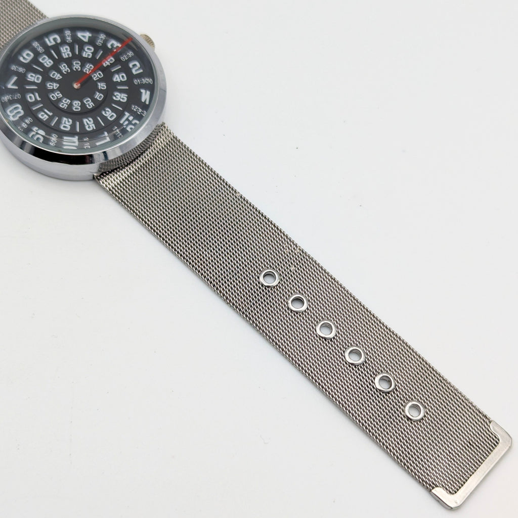 Raidu Spinning Disc Novelty Watch — Quartz, Mesh Strap, Sold Naked - Bezel & Hide