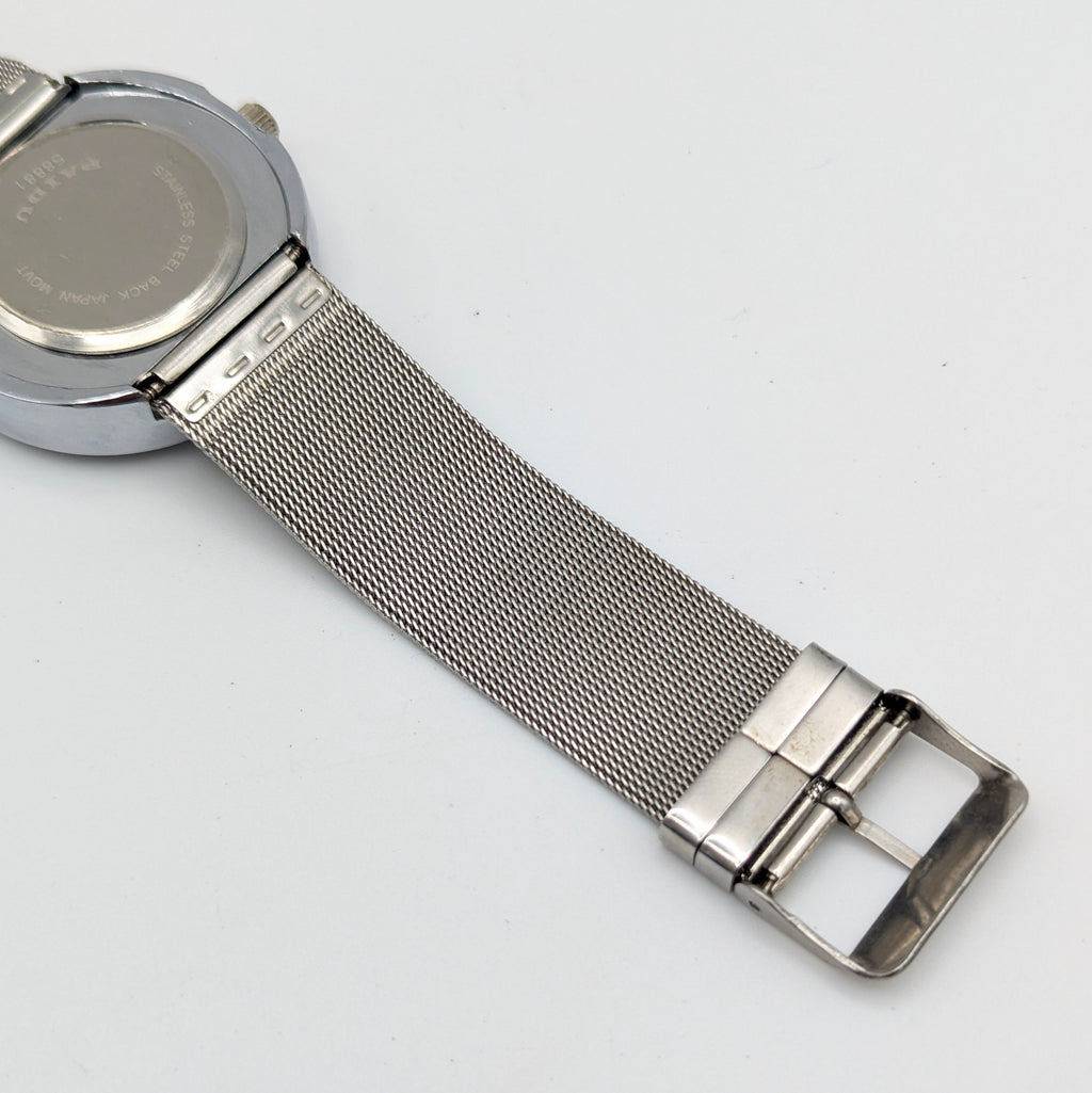Raidu Spinning Disc Novelty Watch — Quartz, Mesh Strap, Sold Naked - Bezel & Hide