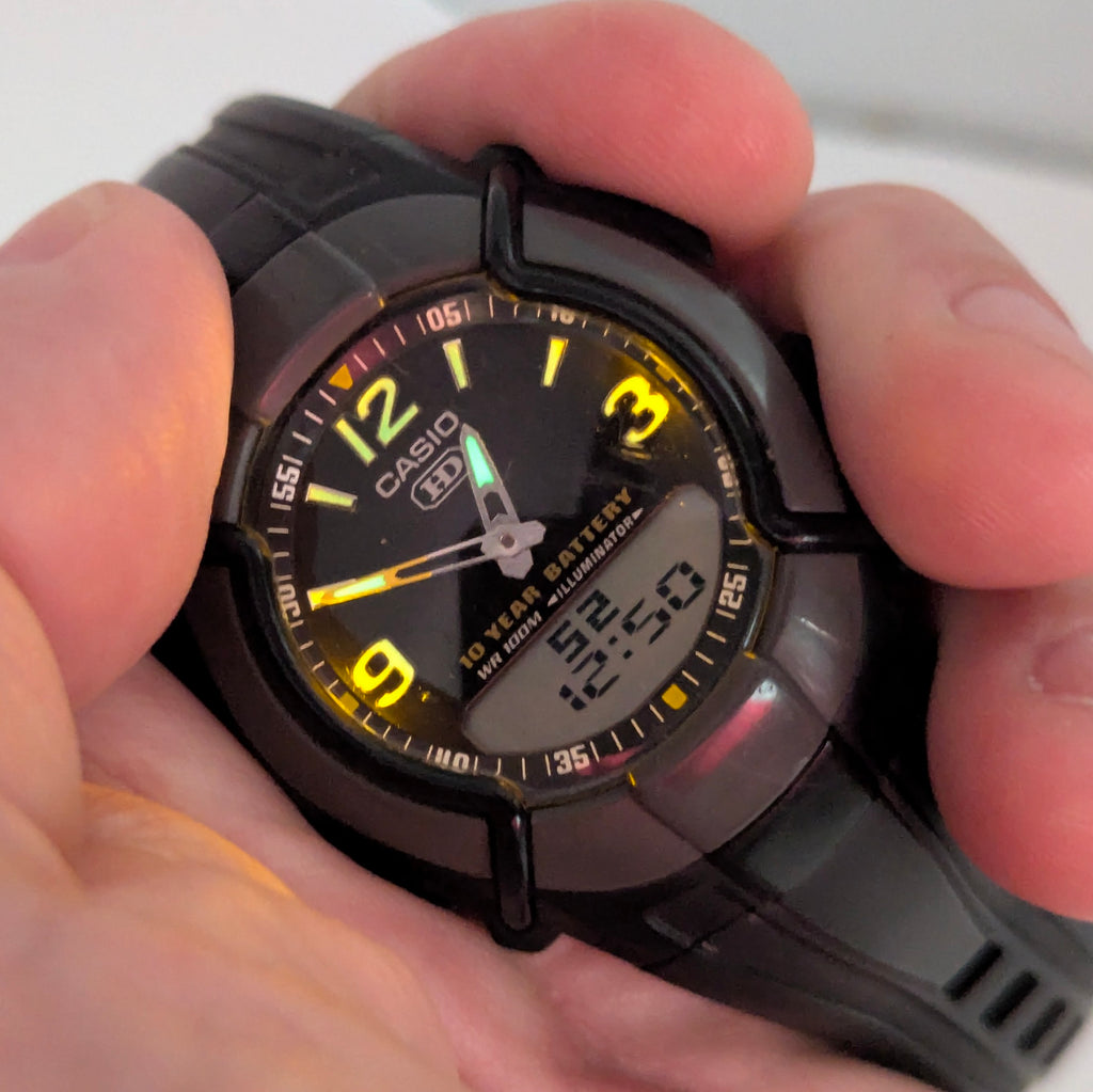 Casio HDC-600 Ana-Digi Men’s Watch — Black Resin, Telememo, 10-Year Battery, WR100M - Bezel & Hide