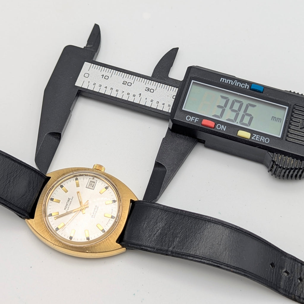 Montine of Switzerland Manual Wind Watch — 1970s Gold-Tone Elegance, Sold Naked - Bezel & Hide