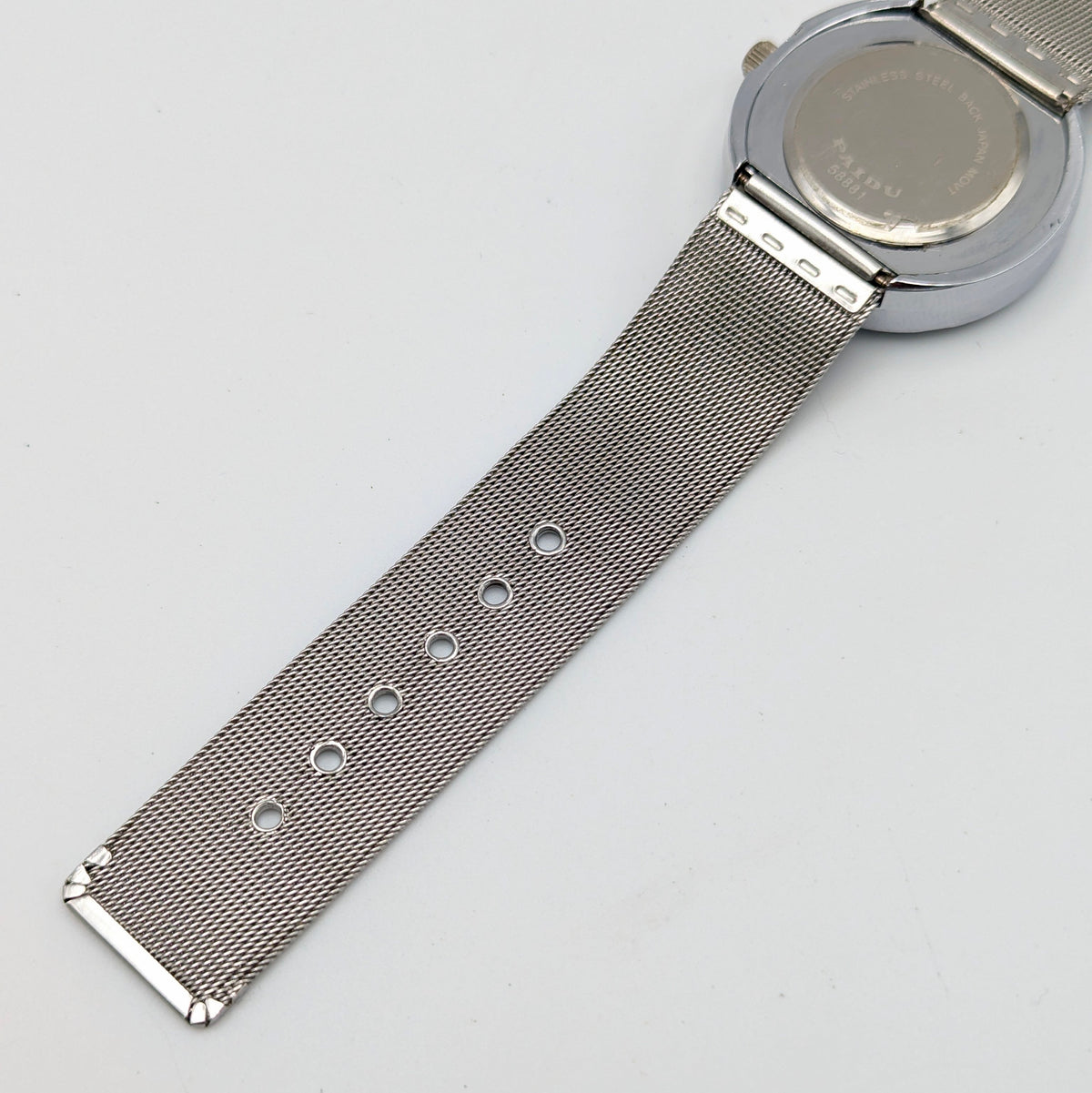 Raidu Spinning Disc Novelty Watch — Quartz, Mesh Strap, Sold Naked - Bezel & Hide