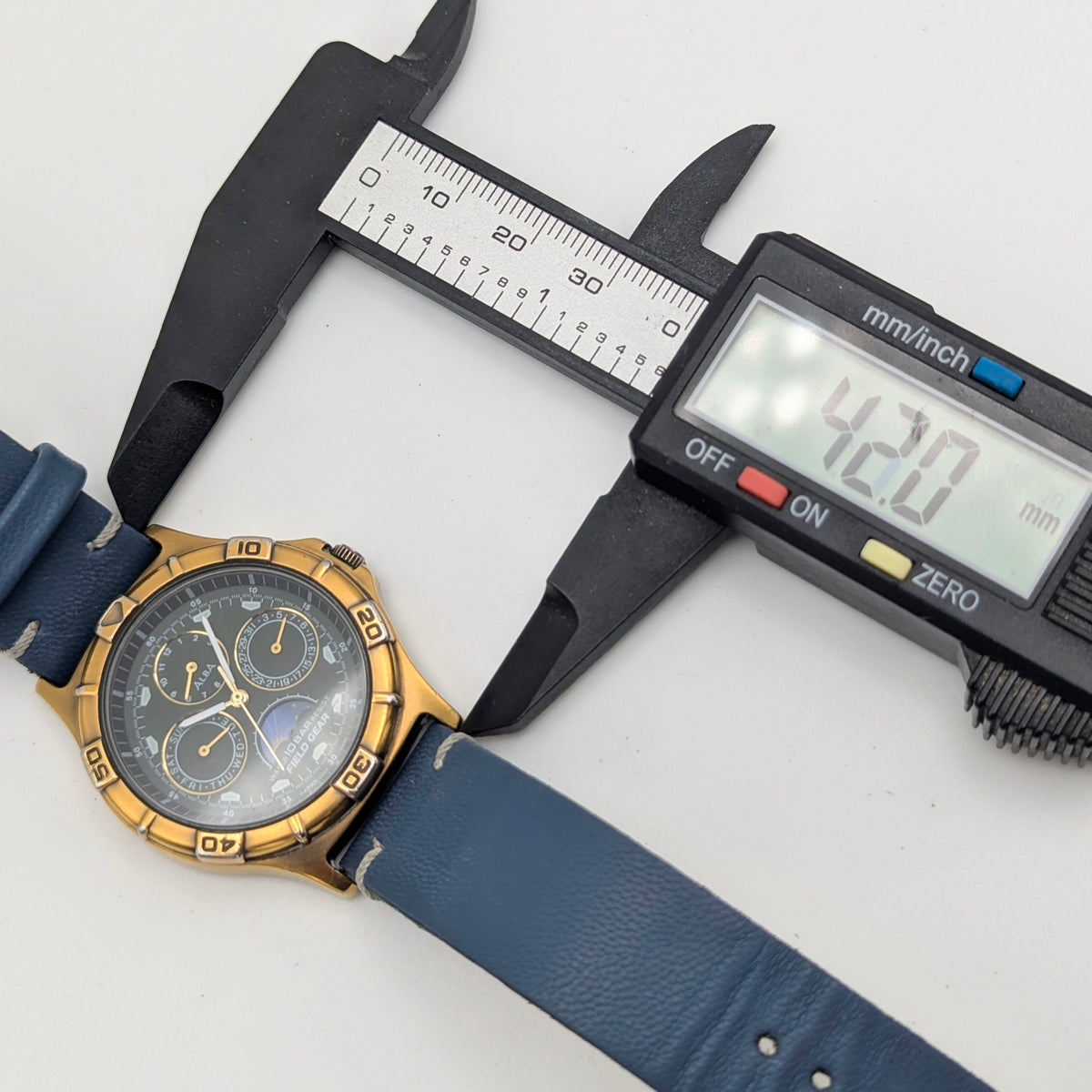 Alba Field Gear V33F-6A80 Triple Calendar Watch – Gold Tone, Dark Dial
