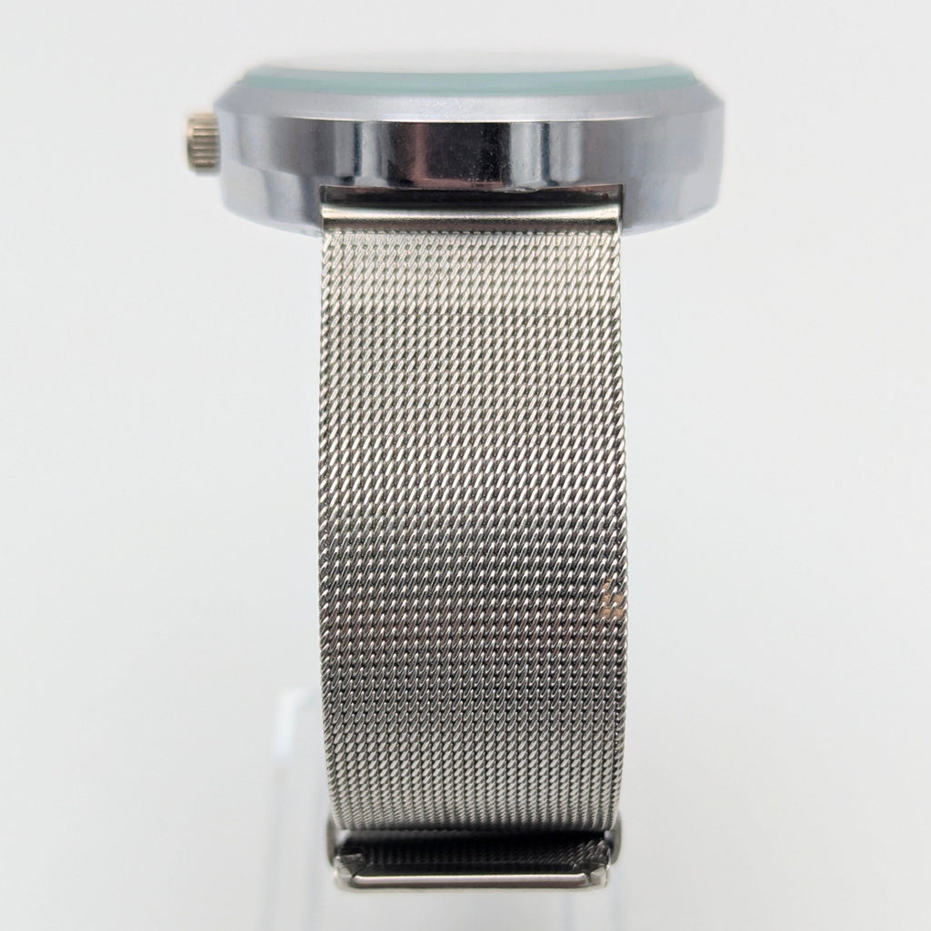 Raidu Spinning Disc Novelty Watch — Quartz, Mesh Strap, Sold Naked - Bezel & Hide