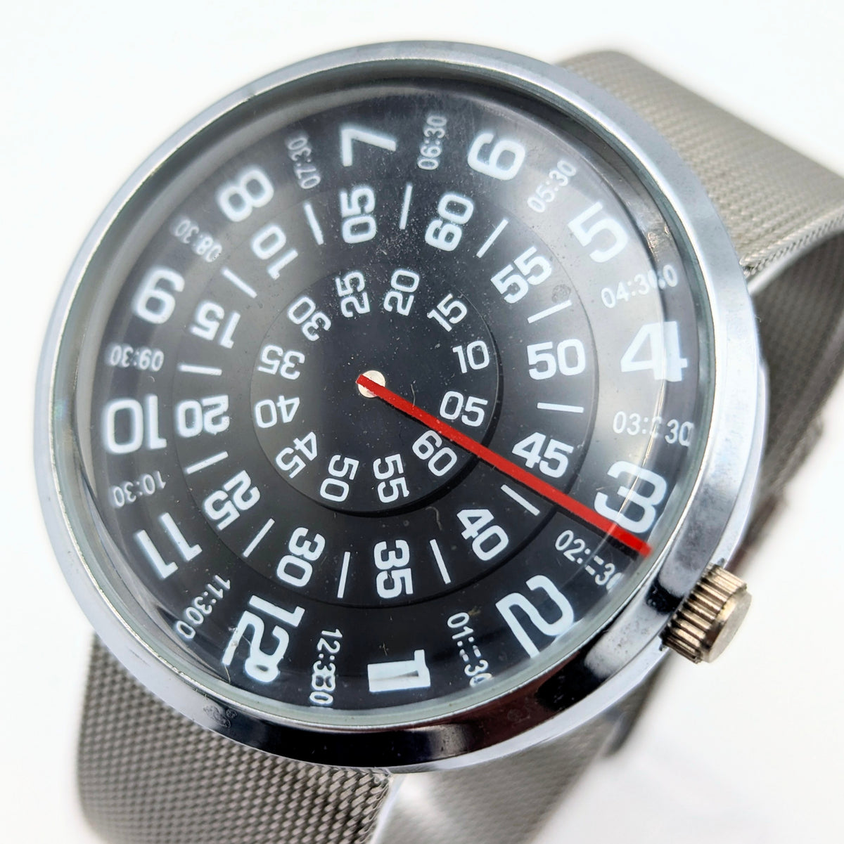 Raidu Spinning Disc Novelty Watch — Quartz, Mesh Strap, Sold Naked - Bezel & Hide