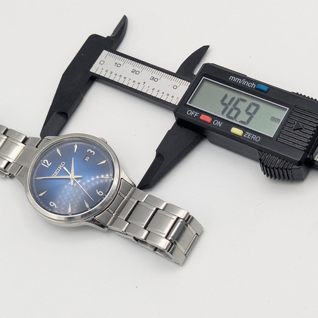 Seiko 7N42 Blue Sunburst Dial Men's Watch — Sold Naked - Bezel & Hide