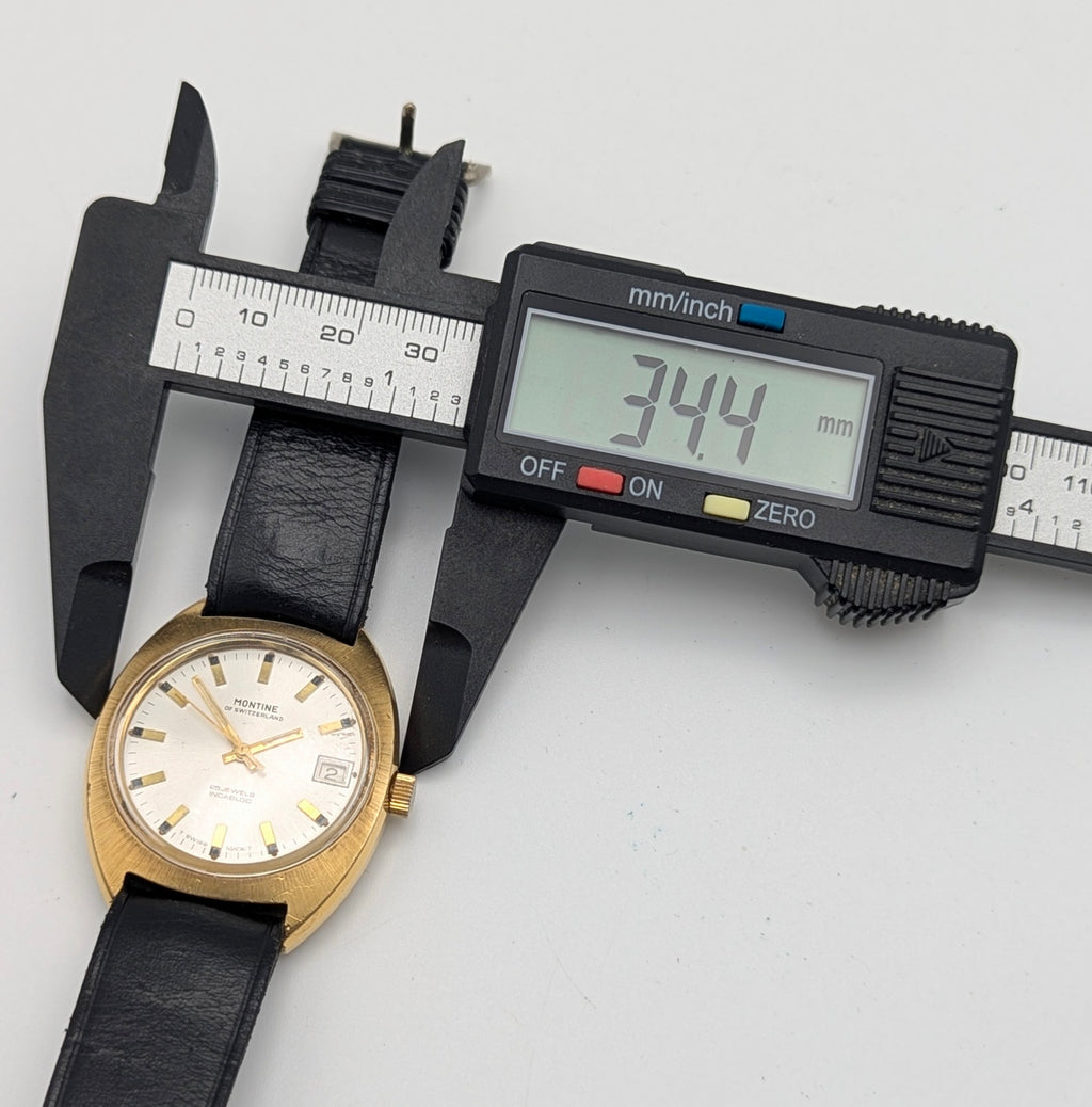 Montine of Switzerland Manual Wind Watch — 1970s Gold-Tone Elegance, Sold Naked - Bezel & Hide