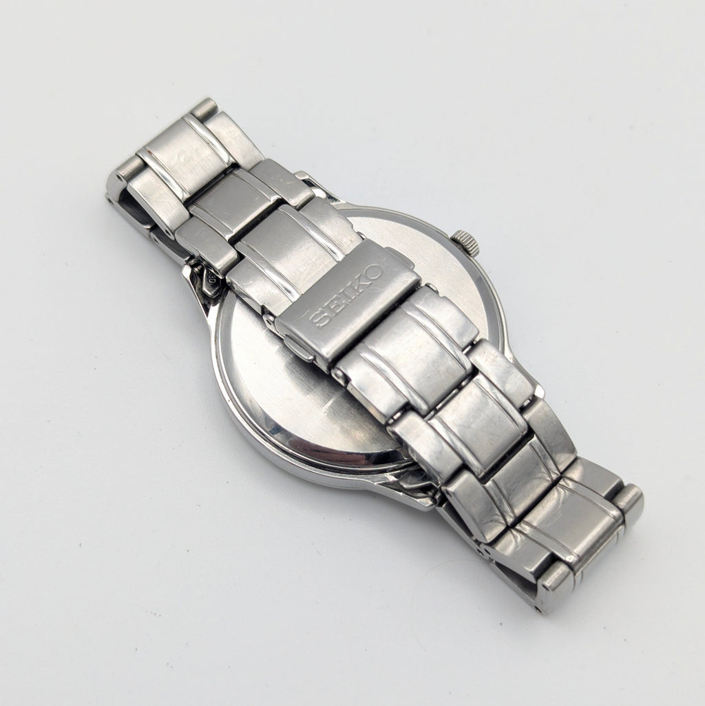 Seiko 7N42 Blue Sunburst Dial Men's Watch — Sold Naked - Bezel & Hide