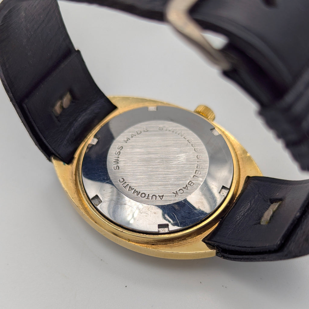 Montine of Switzerland Manual Wind Watch — 1970s Gold-Tone Elegance, Sold Naked - Bezel & Hide