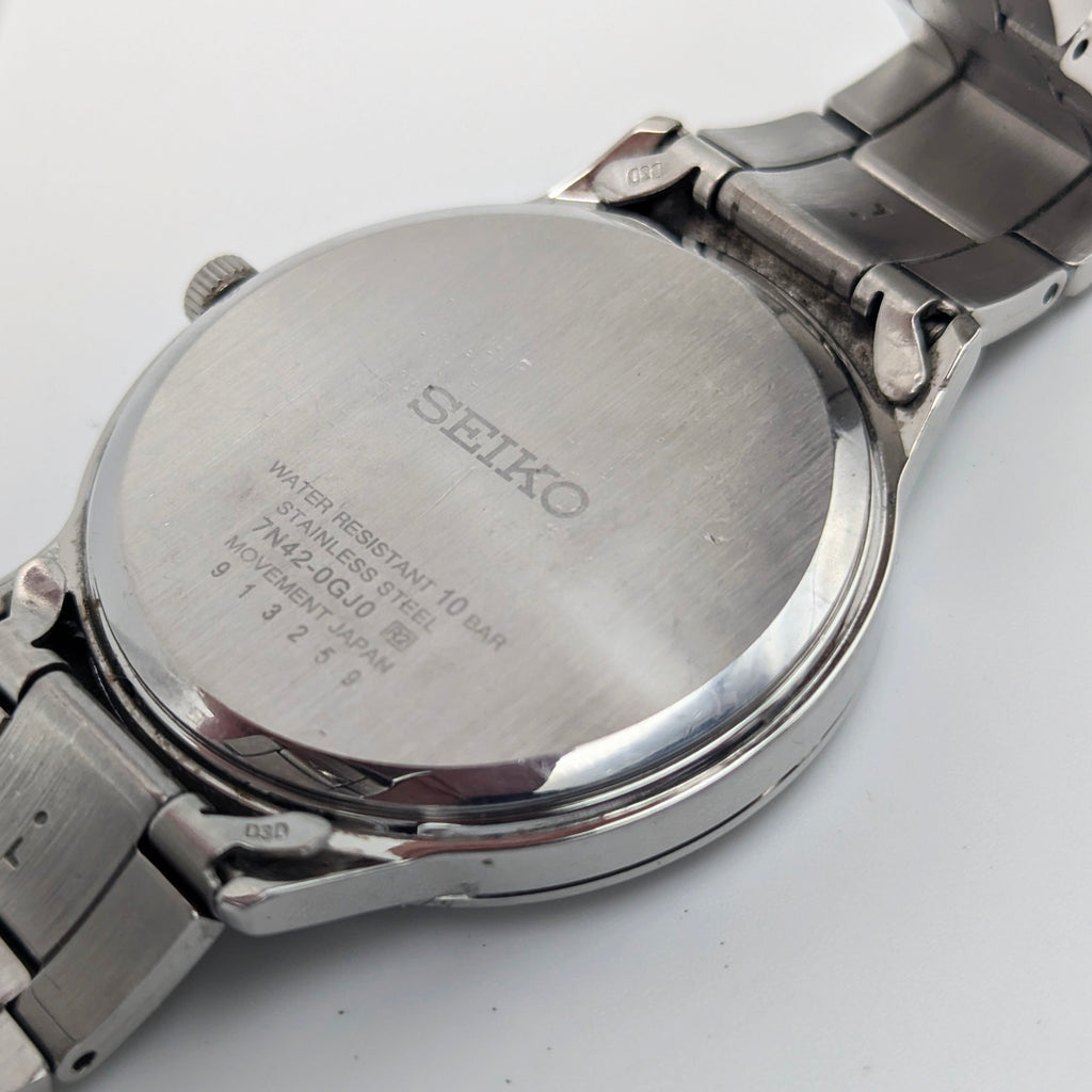 Seiko 7N42 Blue Sunburst Dial Men's Watch — Sold Naked - Bezel & Hide