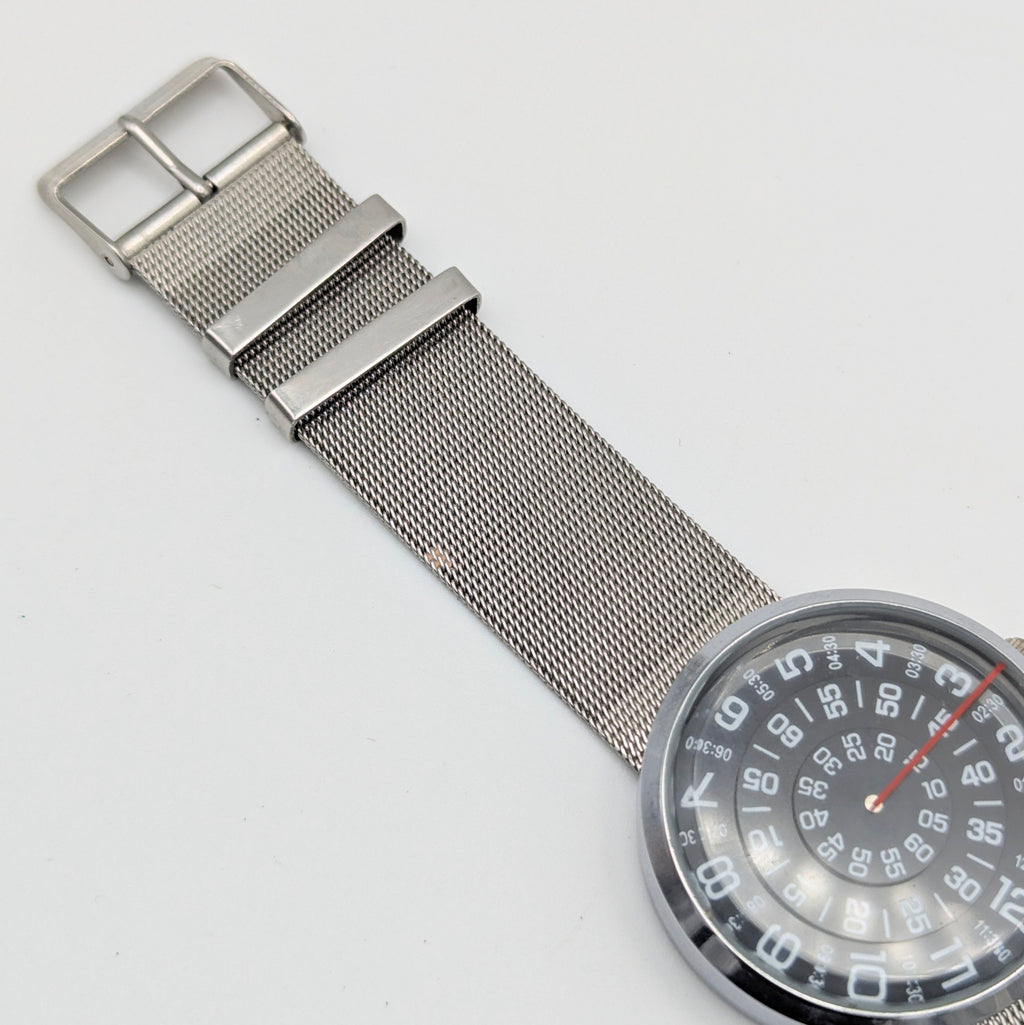 Raidu Spinning Disc Novelty Watch — Quartz, Mesh Strap, Sold Naked - Bezel & Hide