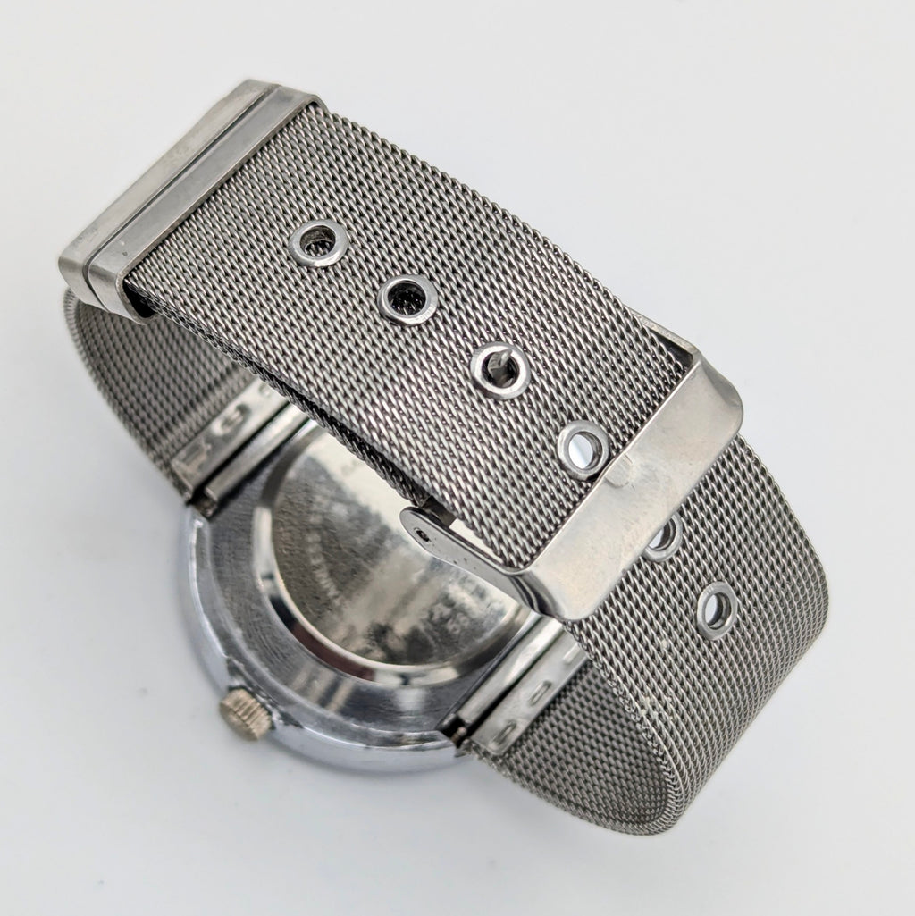 Raidu Spinning Disc Novelty Watch — Quartz, Mesh Strap, Sold Naked - Bezel & Hide
