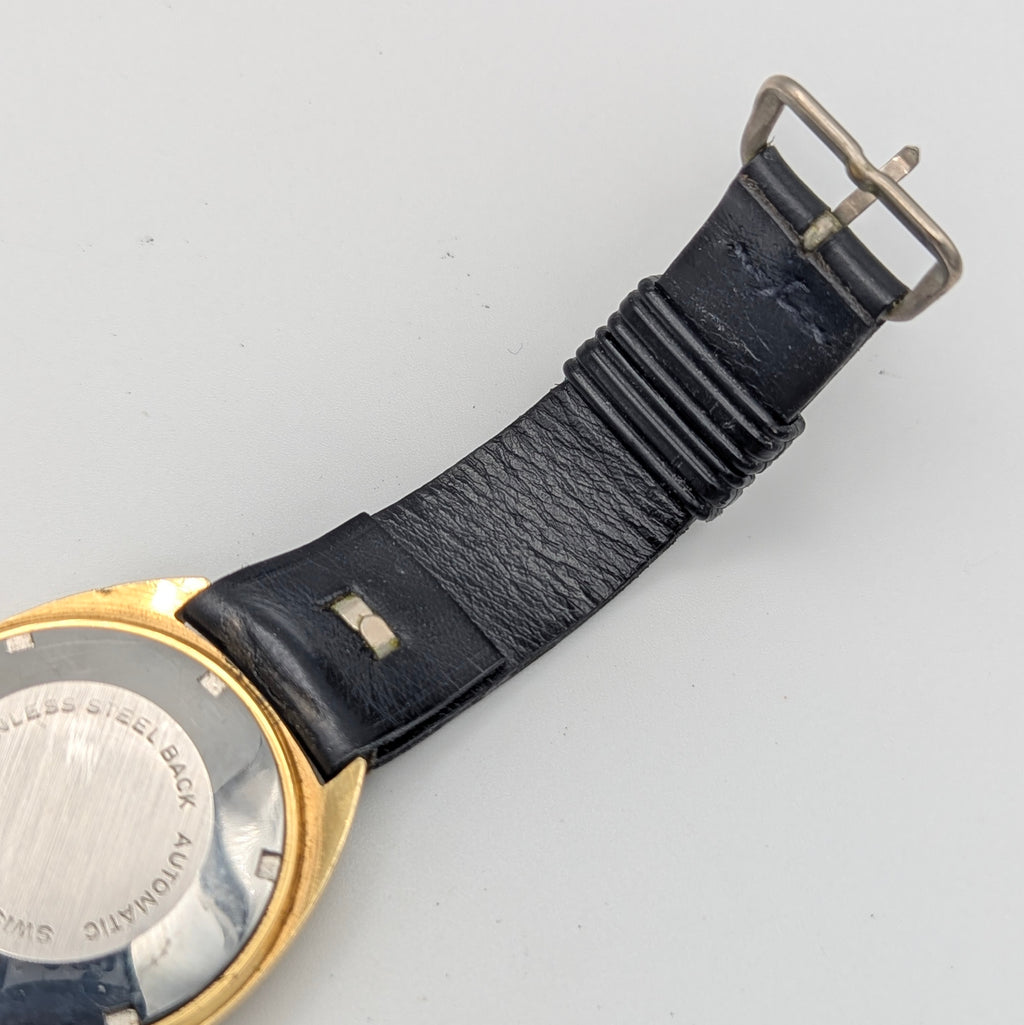 Montine of Switzerland Manual Wind Watch — 1970s Gold-Tone Elegance, Sold Naked - Bezel & Hide